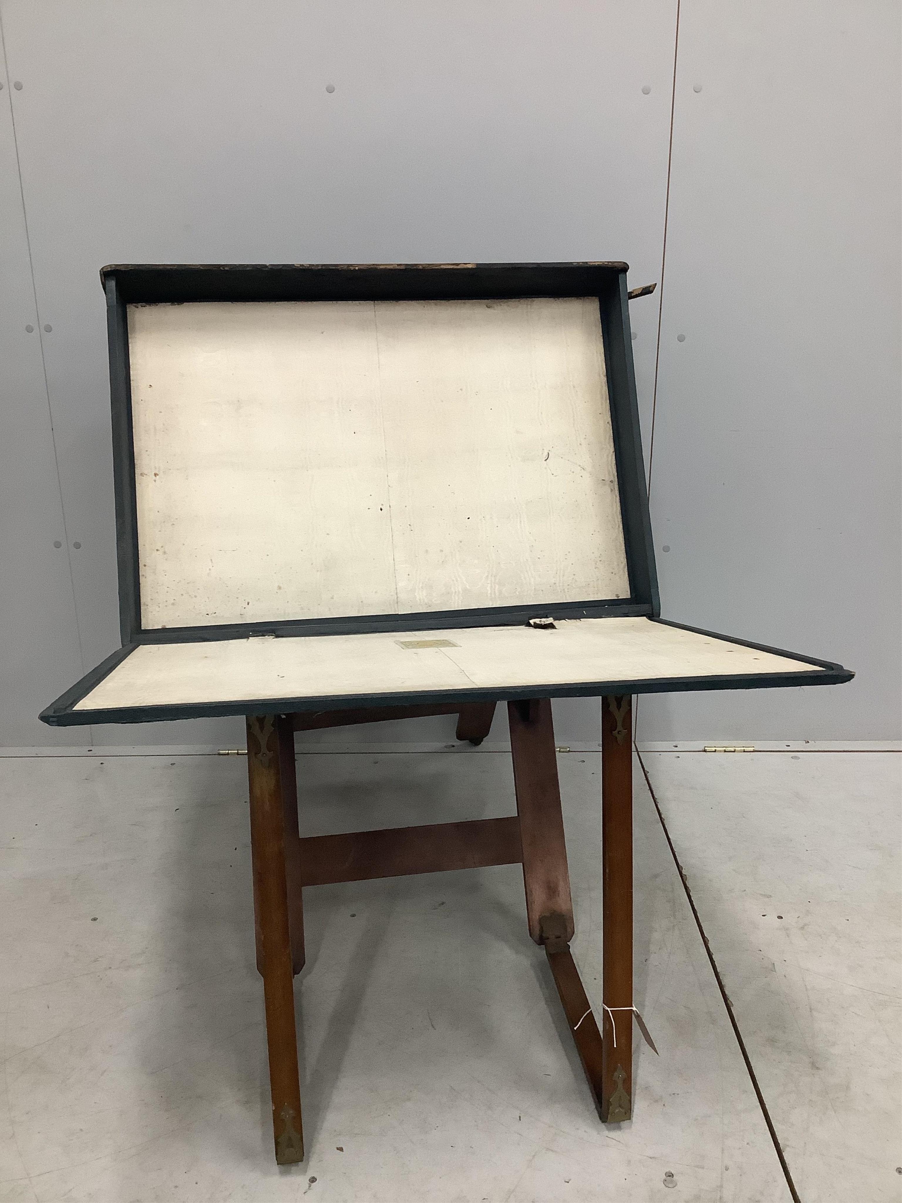 A Victorian brass mounted portfolio stand by Slade Bros. London, width 86cm. Condition - poor to fair